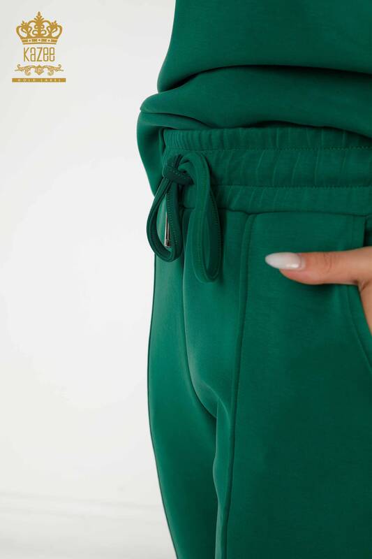 بدلة رياضية نسائية بالجملة باللون الأخضر الأساسي مع جيوب - 17579 | كازي
