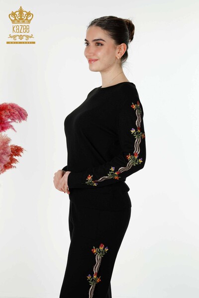 Tuta da donna all'ingrosso nera con motivo floreale colorato - 16528 / KAZEE - Thumbnail