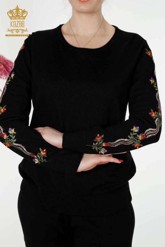 Tuta da donna all'ingrosso nera con motivo floreale colorato - 16528 / KAZEE