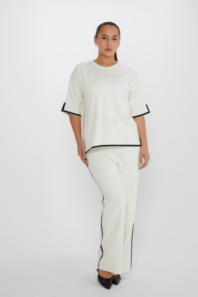 Dwuczęściowy komplet z rozcięciem i krótkim rękawem w kolorze ecru - 31232 | KAZEE (zestaw 2 sztuk M-L) - Kazee (1)