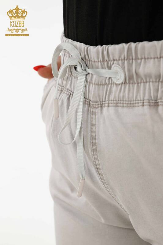 Pantaloni en-gros de damă cu buzunar bej - 3673 | KAZEE