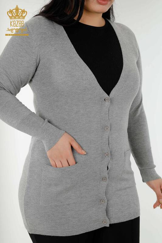 فروش عمده لباس بافتنی زنانه ژاکت کش باف پشمی دکمه دار طوسی - 15803 | KAZEE
