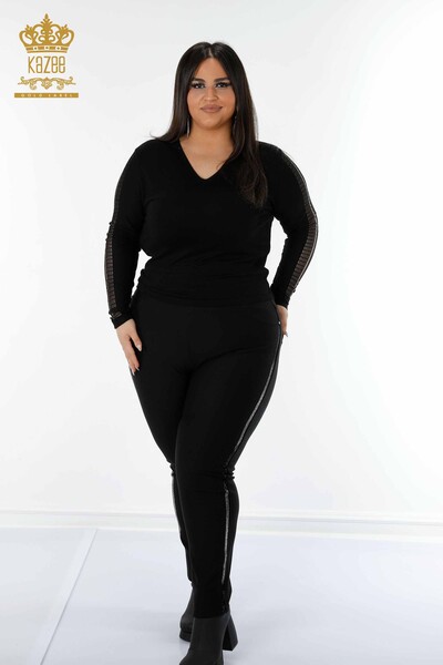 Kazee - Hurtownia spodni damskich legginsów w paski z haftowanym kamieniem w kolorze czarnym - 3611 | KAZEE
