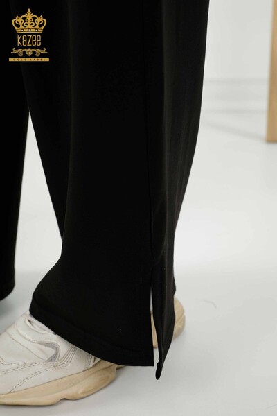 Hurtownia dresu damskiego w kolorze czarnym z kieszenią na krótki rękaw - 17548 | KAZEE - Thumbnail