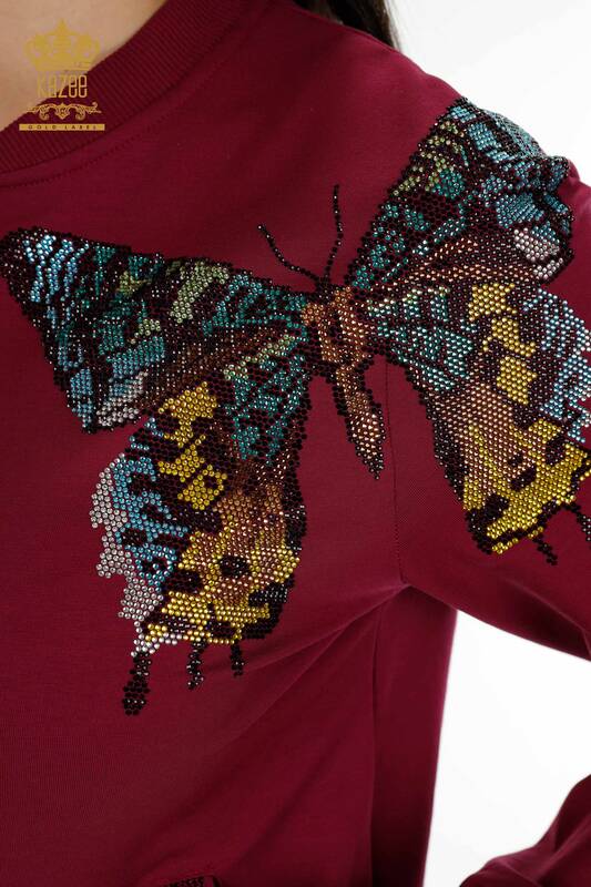 Hurtownia dresów damskich w kolorze śliwkowym w motyle - 17492 | KAZEE
