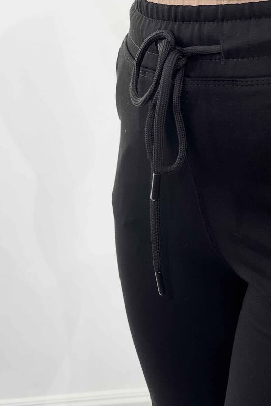 Hurtownia spodni damskich z kieszeniami skórzanymi na nogawkach - 3467 | KAZEE