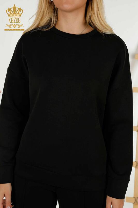 Hurtownia dresu damskiego w kolorze czarnym z podstawowymi kieszeniami - 17579 | KAZEE