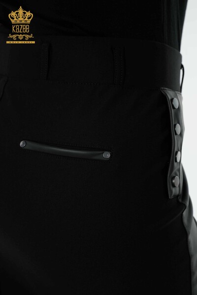 تنورة جلدية نسائية مزينة بأزرار لون أسود - 4220 | كازي - Thumbnail