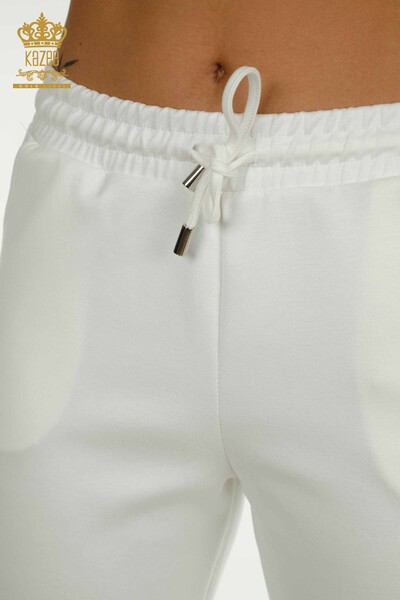 Venta al por mayor Conjunto de chándal triple para mujer con botones detallados Crudo - 17633 | KAZEE - 12