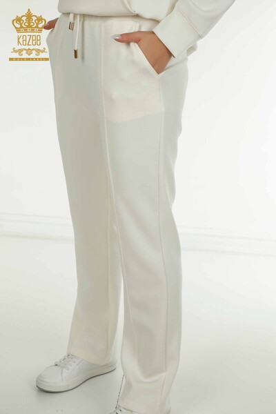 Женский спортивный костюм оптом с карманом и капюшоном цвета экрю - 17627 | КАZEE - Thumbnail