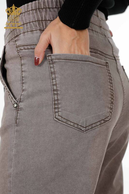 Vente en gros de pantalons pour femmes avec cravate élastique à la taille détaillée avec texte - 3499 | KAZEE