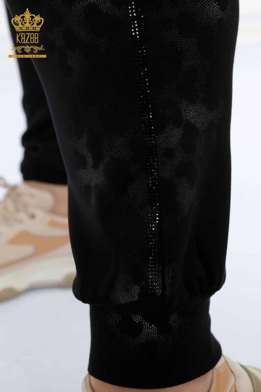 Vente en gros Ensemble de survêtement pour femmes imprimé léopard avec poche en pierre à capuche - 17465 | KAZEE