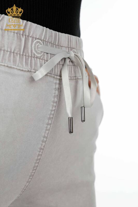 Vente en gros de pantalons pour femmes avec poche brodée en pierre élastique à la taille - 3540 | KAZEE