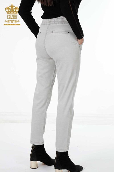 Vente en gros de pantalons pour femmes avec poche brodée en pierre élastique à la taille - 3540 | KAZEE - Thumbnail