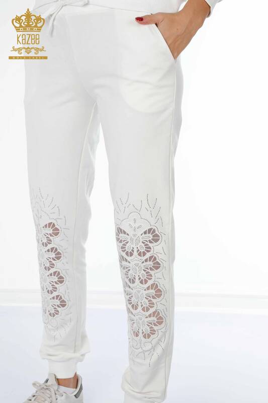 женский спортивный костюм оптом с цветочным узором цвета экрю - 17464 | КАZEE